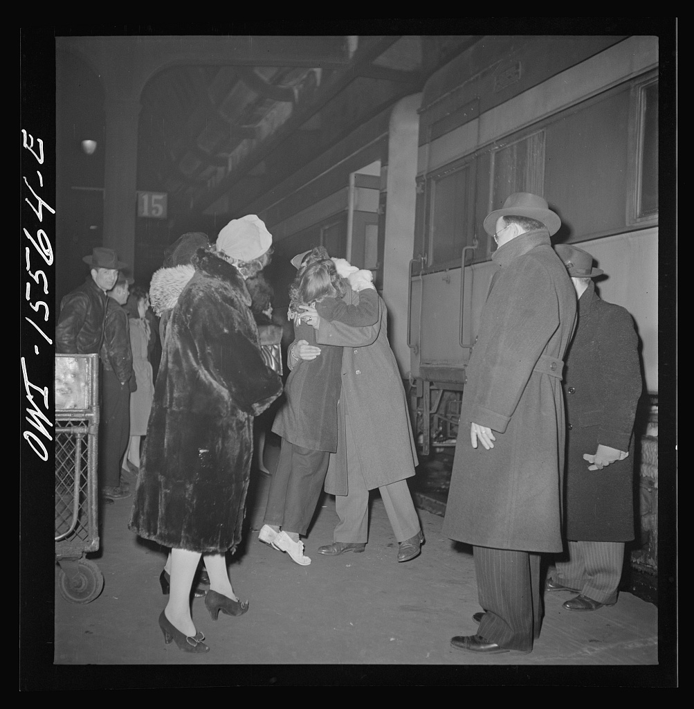 Soldiers saying goodbye to the people seeing them off at Union Station in Chicago, photographed by Jack Delano in January 1943
